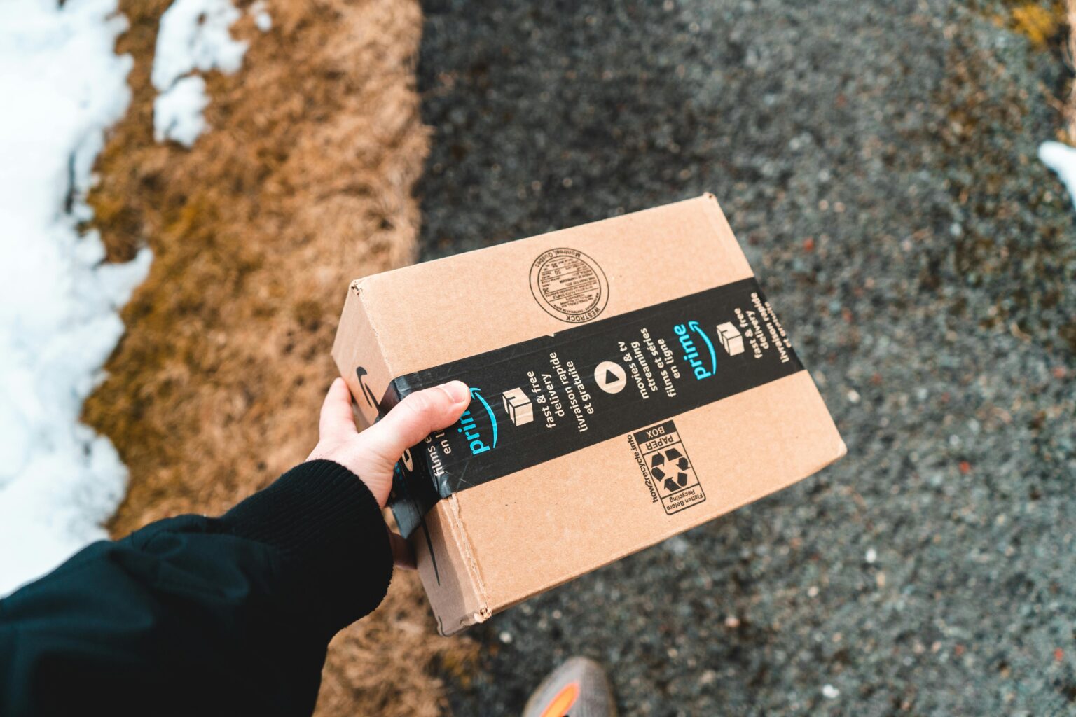 Package from Amazon Prime Carried by the Delivery Man