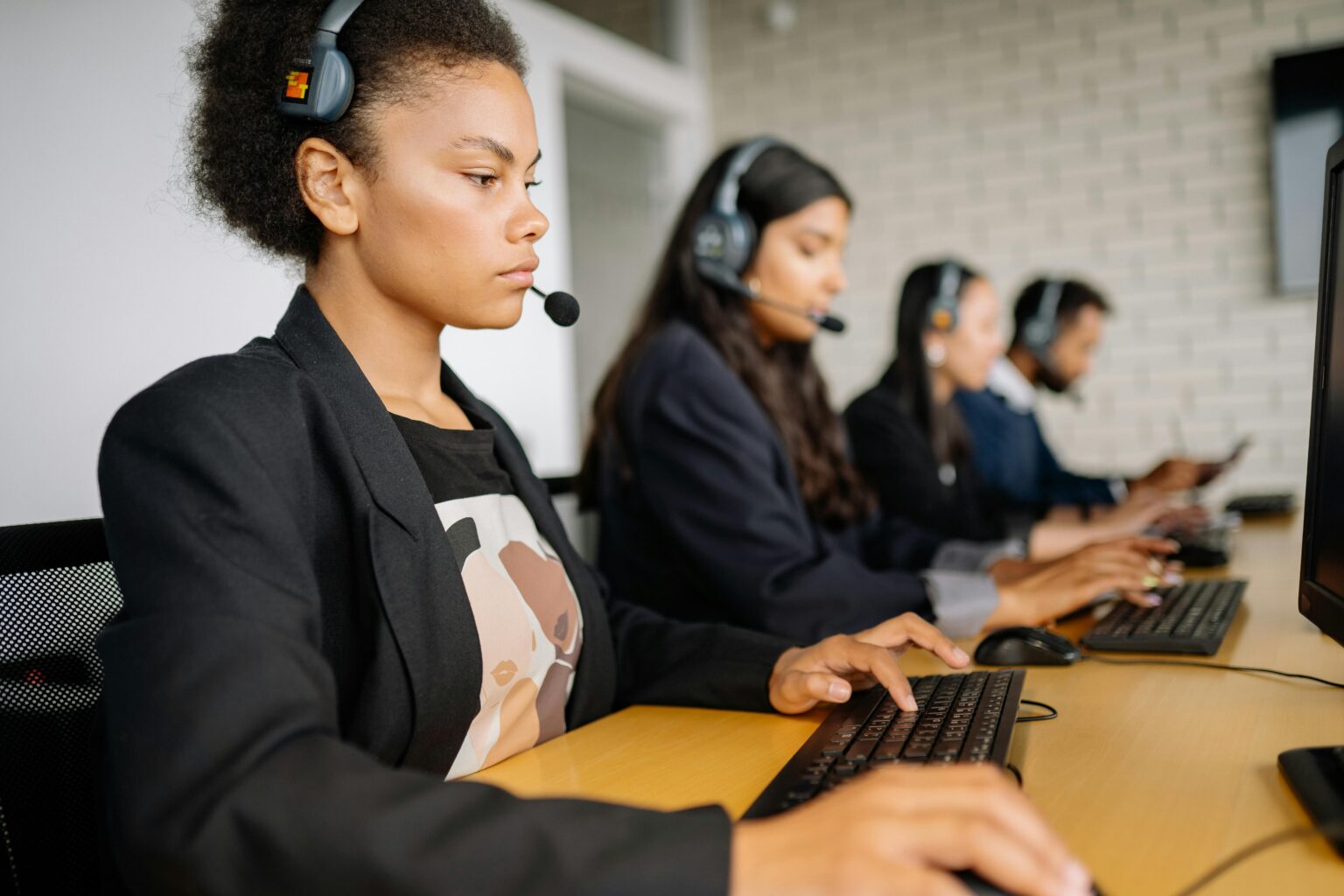 Four People Working in the Office